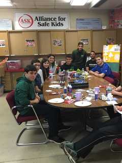Alliance For Safe Kids Volunteers Celebrate Holidays At Field Home
