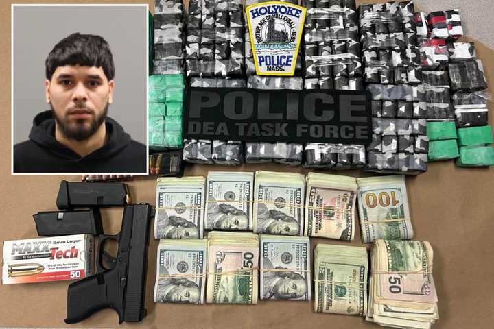 Guns, Stacks Of Cash, Heroin: Police Bust Suspected Trafficker Following Holyoke Raid