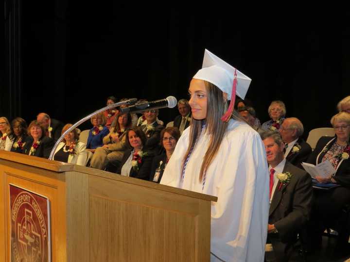 Angela Miano of Trumbull, whose grade point average topped the accelerated class, delivers a message to graduates at the last commencement ceremony for the Bridgeport Hospital School of Nursing.