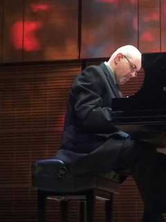 Piano Virtuoso Arkadiy Figlin Performing At Darien Library