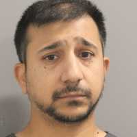 Man Caught Taking Photos Of Women In Bathroom At Long Island School, Police Say