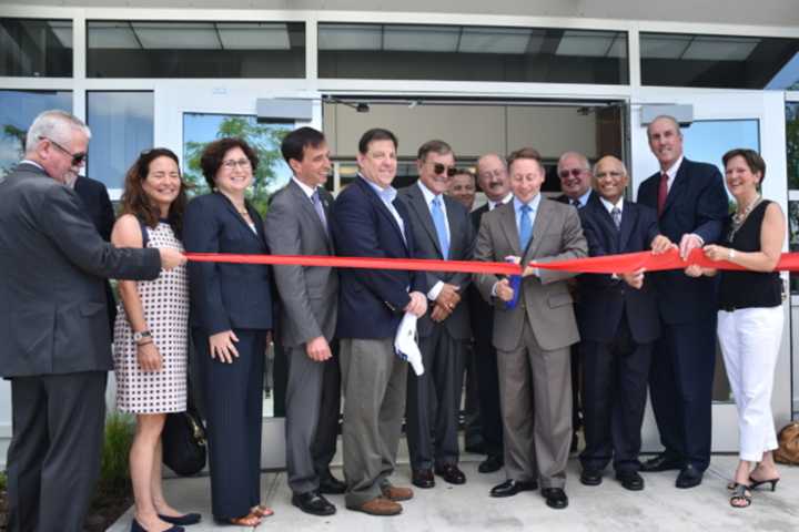 From left: Shay Gavin, Nancy Seligson, MaryJane Shimsky, New Rochelle Mayor Noam Bramson, Jim Maisano, Carl Petrillo, Jay Pisco, Thomas Lauro, County Executive Robert Astorino; Robert Butterworth, Rengachari Nivas, Kevin Plunkett and Sheila Marcotte.