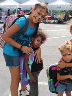 Kids Get Backpacks, Enjoy Barbecue From Yonkers-Based Leake And Watts
