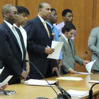 <p>Jacardi Barnes, Ashari Wilson, Justin Draper, Craig Howe and their attorneys.</p>