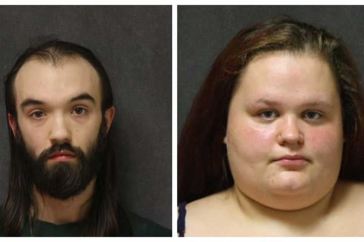 Two Arrested After 2-Year-Old Alone On Roof Of CT Home Rescued