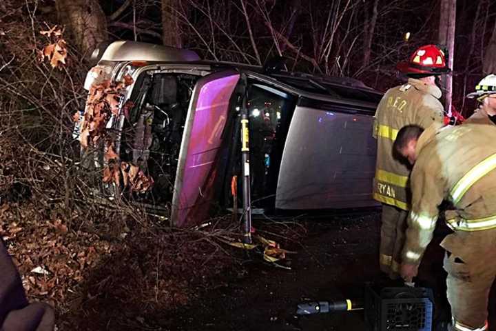First Responders Extricate Driver In Bethel Rollover
