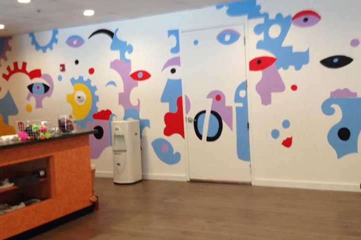 Billy The Artist Painting 24-Foot Mural At JoyRide In Westport 