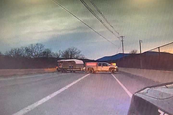 Agitated Man Blocks Upstate NY Roadway With Truck, Camper, Refuses To Move, Police Say