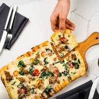 <p>The family-style brunch will feature menu items like flatbreads with pancetta, mushroom, fontina</p>