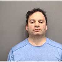 Darien Man Charged With Operating Illegal Kennel Where Animals Were Abused