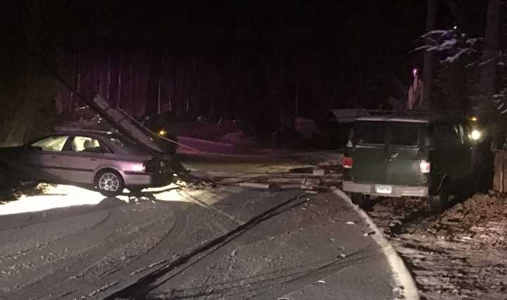 John Street in Greenwich is closed late Saturday by a multi-vehicle crash that took out a pole.