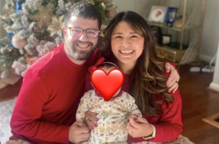 Michael and Vanessa Schwartz with their daughter, Lucy.