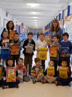 Carrie E. Thomkins Elementary Students Donate 40 Boxes Of Food