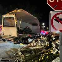 Box Truck Overturns In CT, Spills Produce Onto Road