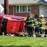 <p>Firefighters from New Milford and River Edge teamed up to extricated the driver after his SUV was rammed by another whose driver ran a stop sign, police said.</p>