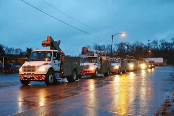 ON THE JOB: Jersey Central Power &amp; Light responding to an earlier electric emergency. Lakewood utility customers were suffering the latest power outage amidst a major nationwide heat wave