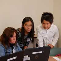 <p>Ossining 6th-graders demonstrate coding to workshop attendees at the recent Putnam-Northern Westchester BOCES conference in Yorktown.</p>
