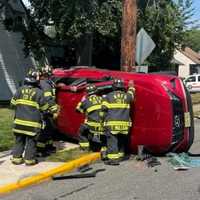 <p>Firefighters extricated the New Milford driver after his 2022 Hyundai Tucson got knocked on its side into a utility pole.</p>