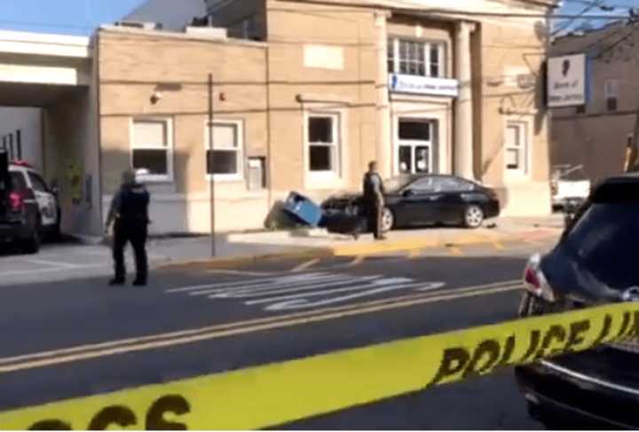 The crash occurred around 6 p.m. outside the Bank of New Jersey.