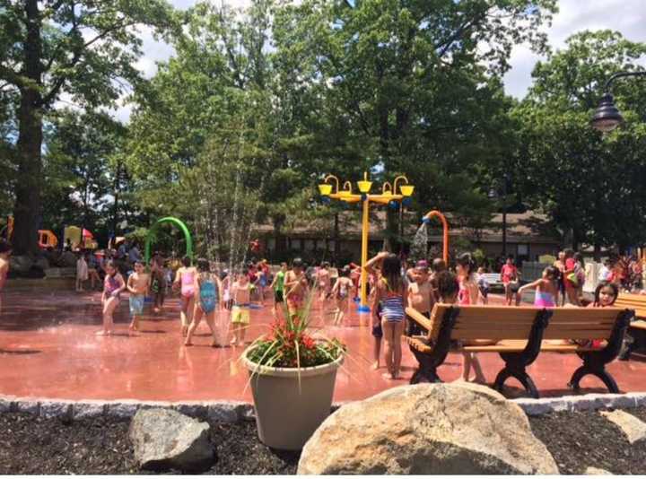 Hundreds of kids were playing in the new spray park, resident Michael Russo said