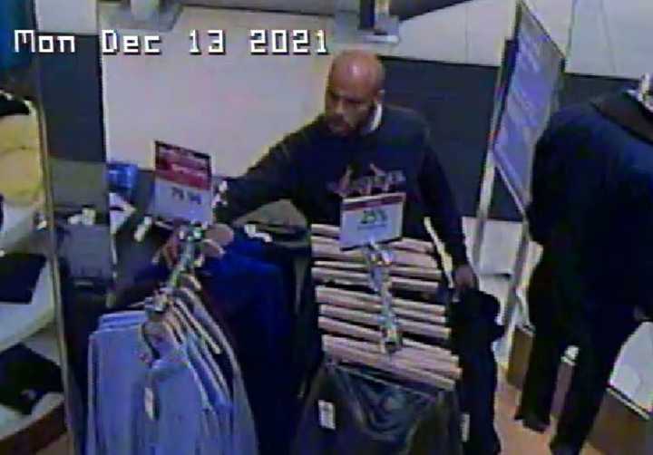 Authorities have asked the public for help locating a man accused of stealing clothes worth more than $1,000 from a Long Island store.