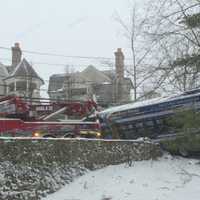 <p>A heavy duty wrecker pulls out the crashed CTTransit bus in Greenwich.</p>