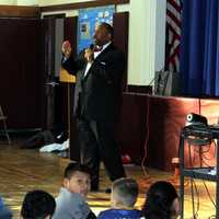 <p>Dr. Corey W. Reynolds, principal of the Roosevelt Elementary School in Ossining, sets fifth-graders a task -- find some way to help their neighbors, town, village ... or the world.</p>