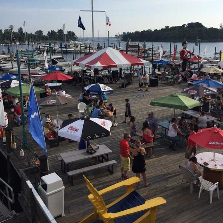 Captain&#x27;s Cove Seaport, located on historic Black Rock Harbor in Bridgeport, has a large outdoor deck ideal for summer dining.