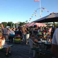 <p>Captain&#x27;s Cove Seaport in Bridgeport offers family friendly outdoor dining on its spacious deck.</p>