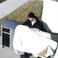 <p>This unidentified man took two TVs from a Wayne hotel, police said.</p>