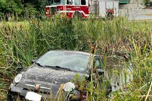 Car Takes A Dip After Leaving Ramp Off Route 128 In Lexington: Firefighters