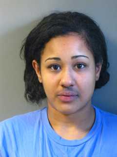 Woman Kicks, Punches, Spits On Officer Following Nassau Crash, Police Say