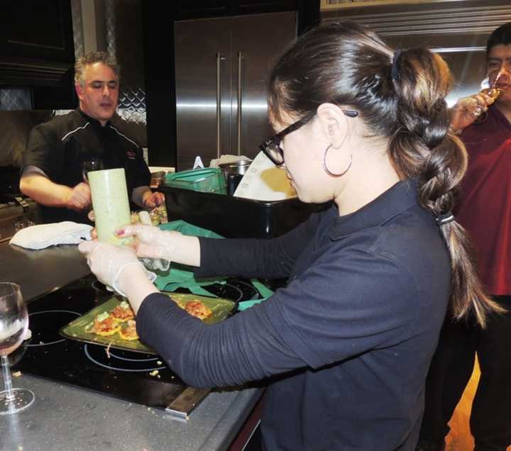 Chef preparing dishes at last year&#x27;s Galaxy of Gourmets