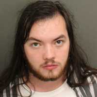 CT Man Charged With Taking Photos Of Child In Disney Bathroom, Police Say