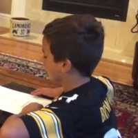 <p>C.V. Starr Intermediate School student Colin LaMoreaux uses videography to complete a math assignment.</p>