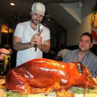 <p>Dave DiBari carving one of his favorite dishes -- pig.</p>