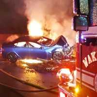 Tesla Erupts In Flames After Wakefield Crash