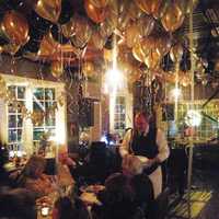 <p>Gold balloons lend a festive air to New Year&#x27;s celebrations at Crabtree&#x27;s Kittle House in Chappaqua.</p>