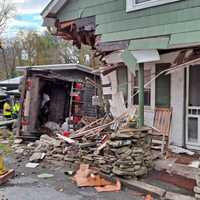 Garbage Truck Crashes Into Home In Region