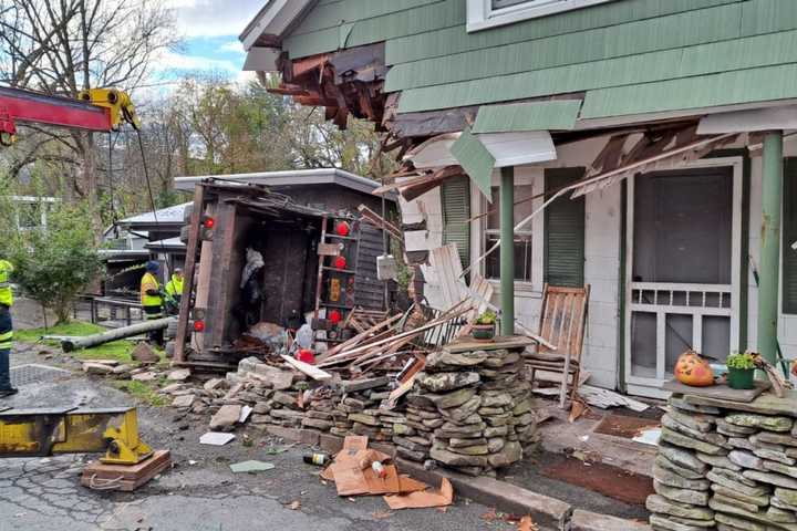 Garbage Truck Crashes Into Home In Region