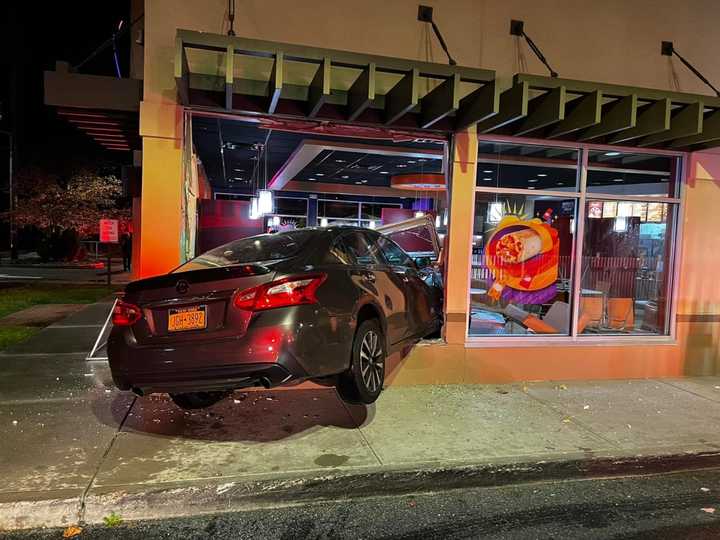 Authorities are investigating after a car crash into a Long Island Taco Bell.