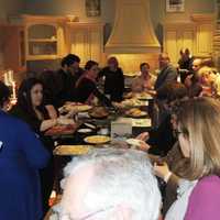 <p>A crowd around a cooking station at Galaxy of Gourmets</p>