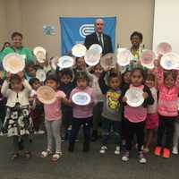 <p>Westchester Deputy County Executive Kevin Plunkett has fun with Reading Buddies.</p>