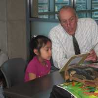 <p>Westchester Deputy County Executive Kevin Plunkett takes part in the Reading Buddies program.</p>