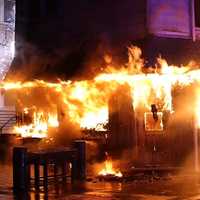 <p>Firefighters found flames engulfing the bar and spreading quickly through the upper floors.
  
</p>