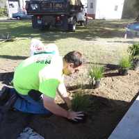 <p>Landscaper Brian Kolwicz recently donated his time and labor to spruce up the Vietnam Memorial in Rogers Park in Danbury</p>