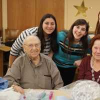 <p>Residents of the Jewish Home in Rockleigh sort medical equipment with students from Maayanot Yeshiva High School in Teneck. </p>