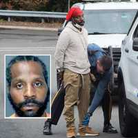 <p>NJ State Police troopers take Greyhound bus passenger Christopher Milton of Long Island into custody on southbound Route 17 in Ridgewood.</p>