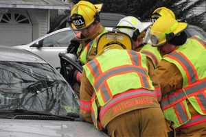 PHOTOS: Paramus Firefighters Free Driver Trapped In Crash