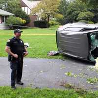 <p>The Kia Sportage came to rest on its side in the driveway of a Glen Rock home.</p>